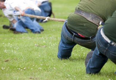 A tug of war contest at a highland games event in Scotland