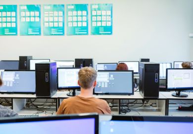 Students using computer during programming lesson Students using computer during programming lesson