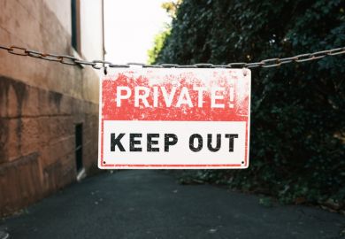 Keep out sign on a metal chain Keep out sign on a metal chain