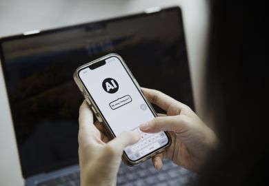 A person holding a smartphone displaying a conversation with an AI tool which says "Hi, may I help you?"