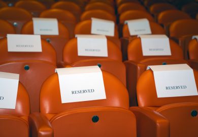 Reserved seating in an empty movie theatre