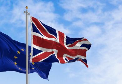 Flags of United Kingdom and the European Union waving in the wind