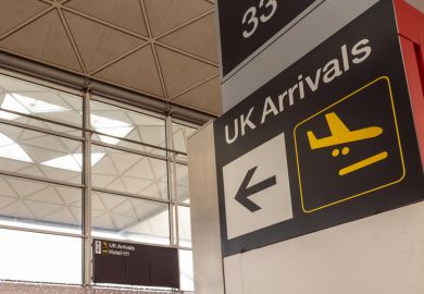  UK arrivals sign in a modern airport terminal