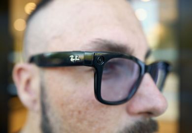 A man wears Google smart glasses