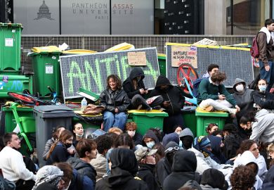 rotesters take part in a blockade action in front of a building of the Pantheon Assas University during a student demonstration in Paris, on October 8, 2026