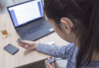 Woman with hearing aid
