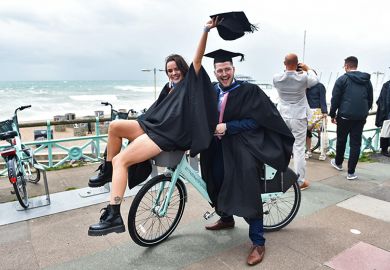 Students celebrate their success on graduating from the University of Brighton on a windy seafront after the ceremony. As an illustration that the public perception of 'graduate regret' is overestimated. Students celebrate their success on graduating from the University of Brighton on a windy seafront after the ceremony. As an illustration that the public perception of 'graduate regret' is overestimated.