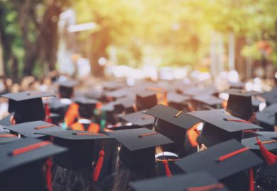 istock graduates lot of graduates crowd together