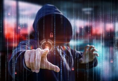 A hooded figure and binary code, symbolising hacking