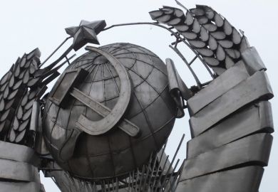 Hammer and sickle symbol on metal sculpture