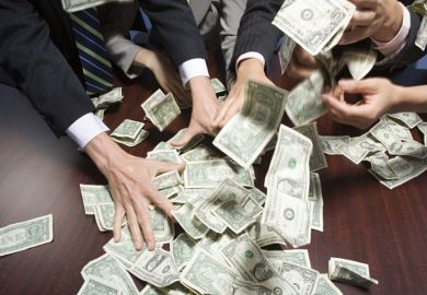 Hands grabbing dollar bills Hands grabbing dollar bills