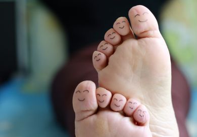 Smiley faces drawn on toes