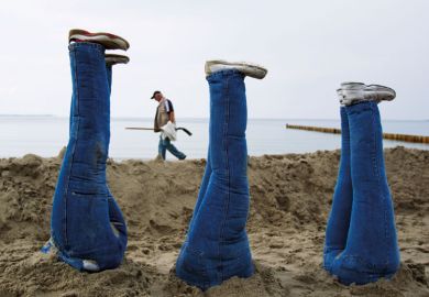 People with their heads in the sand