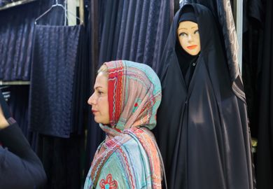 A woman in Tehran wearing a hijab A woman in Tehran wearing a hijab