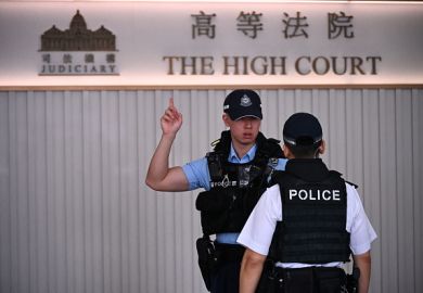 Hong Kong police outside the territory's High Court Hong Kong police outside the territory's High Court