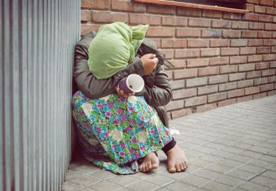 Homeless woman begging
