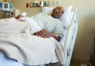 Man in hospital bed