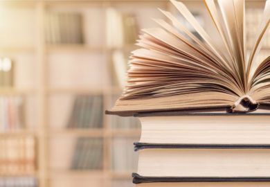 Open book humanities, symbolising threat to journals by open access