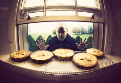 Hungry man looking longingly at row of pies Hungry man looking longingly at row of pies