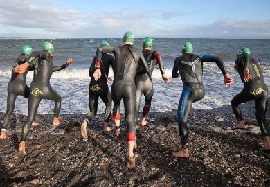 Athletes start the swim section of an ironman competition, Edinburgh, Scotland. To illustrate universities preparing for a ‘highly competitive’ clearing round. Athletes start the swim section of an ironman competition, Edinburgh, Scotland. To illustrate universities preparing for a ‘highly competitive’ clearing round.