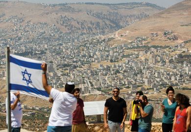 Israelis with flag of Israel