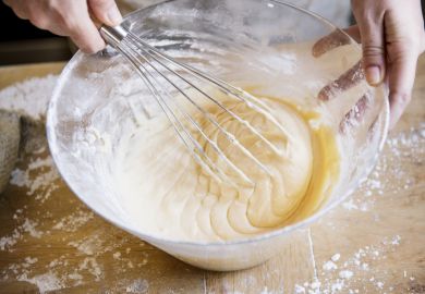 Whisk is used to mix something in a glass bowl