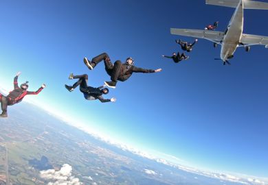 Group of skydivers having fun at the skies