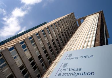 British immigration concept with Lunar House building the Home Office Visas and Immigration Office in Greater London, England, UK