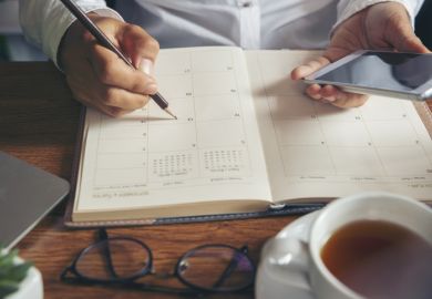 planner writing daily appointment