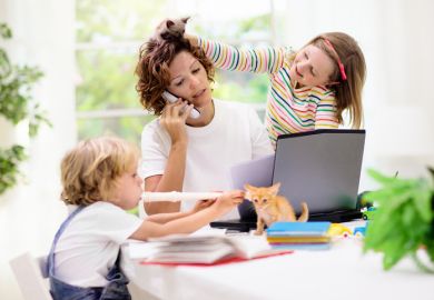 Woman working home with kids