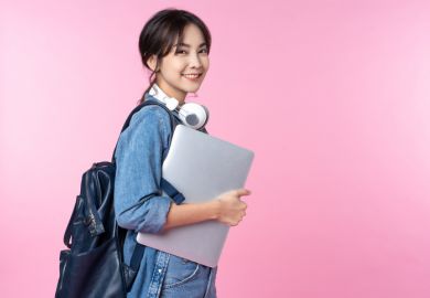 Smiling young Asian student Smiling young Asian student