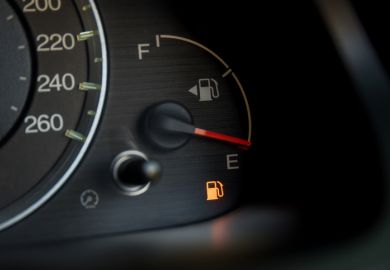 Empty fuel warning light in car dashboard