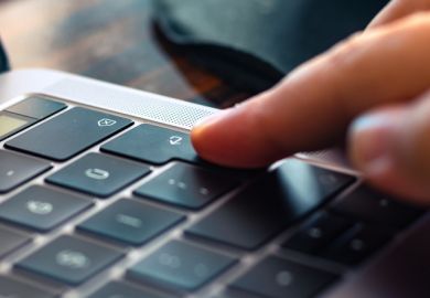 Pressing Enter button on the keyboard of laptop.