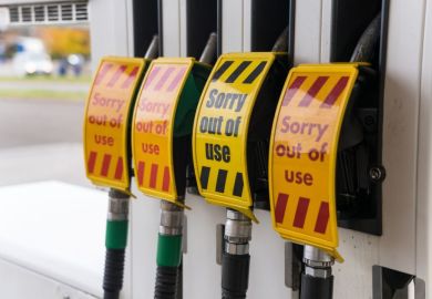 Out of use signs on petrol station pumps 