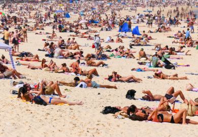 Crowd of people on Bondi Beach in the Eastern Suburbs of Sydney