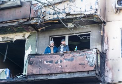 Damage to an apartment building in Kyiv, an explosion due to a hit by a military shell.