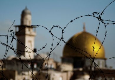 Jerusalem seen through barbed wire