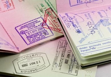 Set of passports with visa and immigration stamps for travel to asia