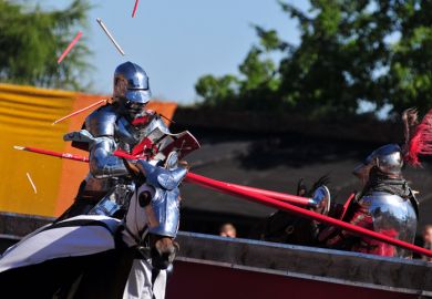 A knight on horseback jousting