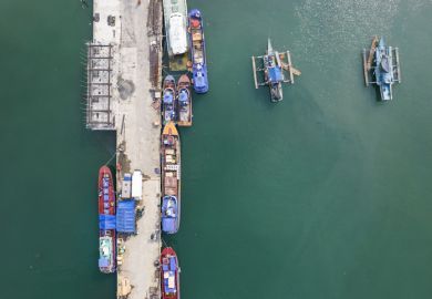 Aerial of the wharf and seaport of the town of Sual