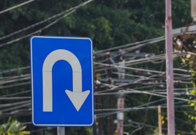 Right U turn sign on blue colored board with cityscape backgrounds.