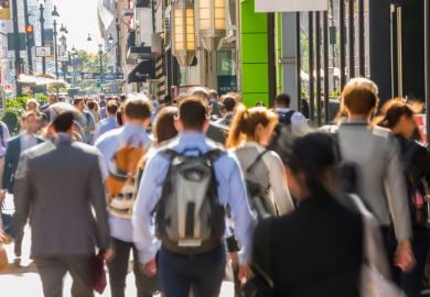 Commuters and pedestrians on busy pavement, Central Manhattan, New York, USA Commuters and pedestrians on busy pavement, Central Manhattan, New York, USA