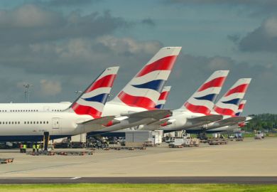 Tail fins of planes operated by British Airways at London Heathrow airport.