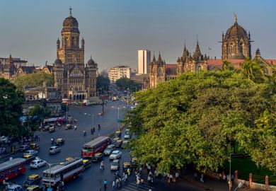 Traffic at Nagar Chowk showing -BMC Brihanmumbai Mahanagar Palika and Victoria terminus.