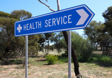 Directional road sign, to health services, small rural Outback town in Western Australia