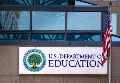Department of Education building in Washington, DC with American Flag Department of Education building in Washington, DC with American Flag