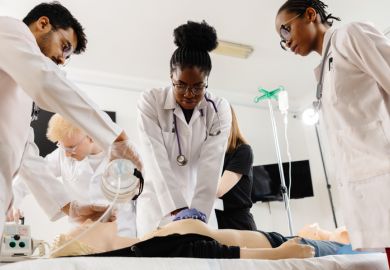 Healthcare professionals practicing cpr and iv insertion during medical training