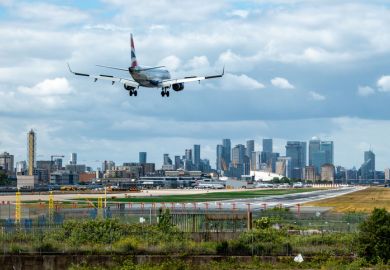 An airplane landing at London City Airport