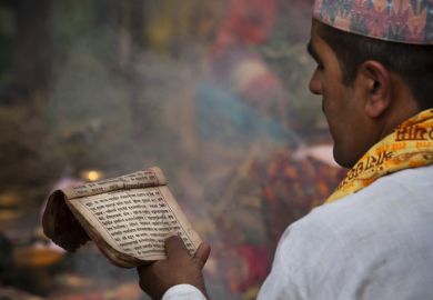Nepalese Brahman reading Hindu religious mantras  Nepalese Brahman reading Hindu religious mantras.