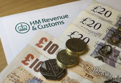 A HMRC letter head surrounded by British bank notes and coins A HMRC letter head surrounded by British bank notes and coins